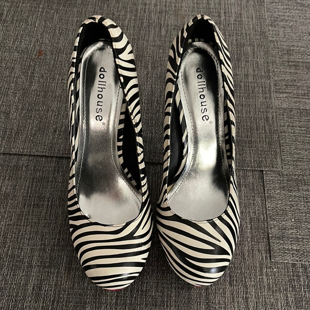 Dollhouse heels. Platform 1” high. Heel is 5 1/2” high.